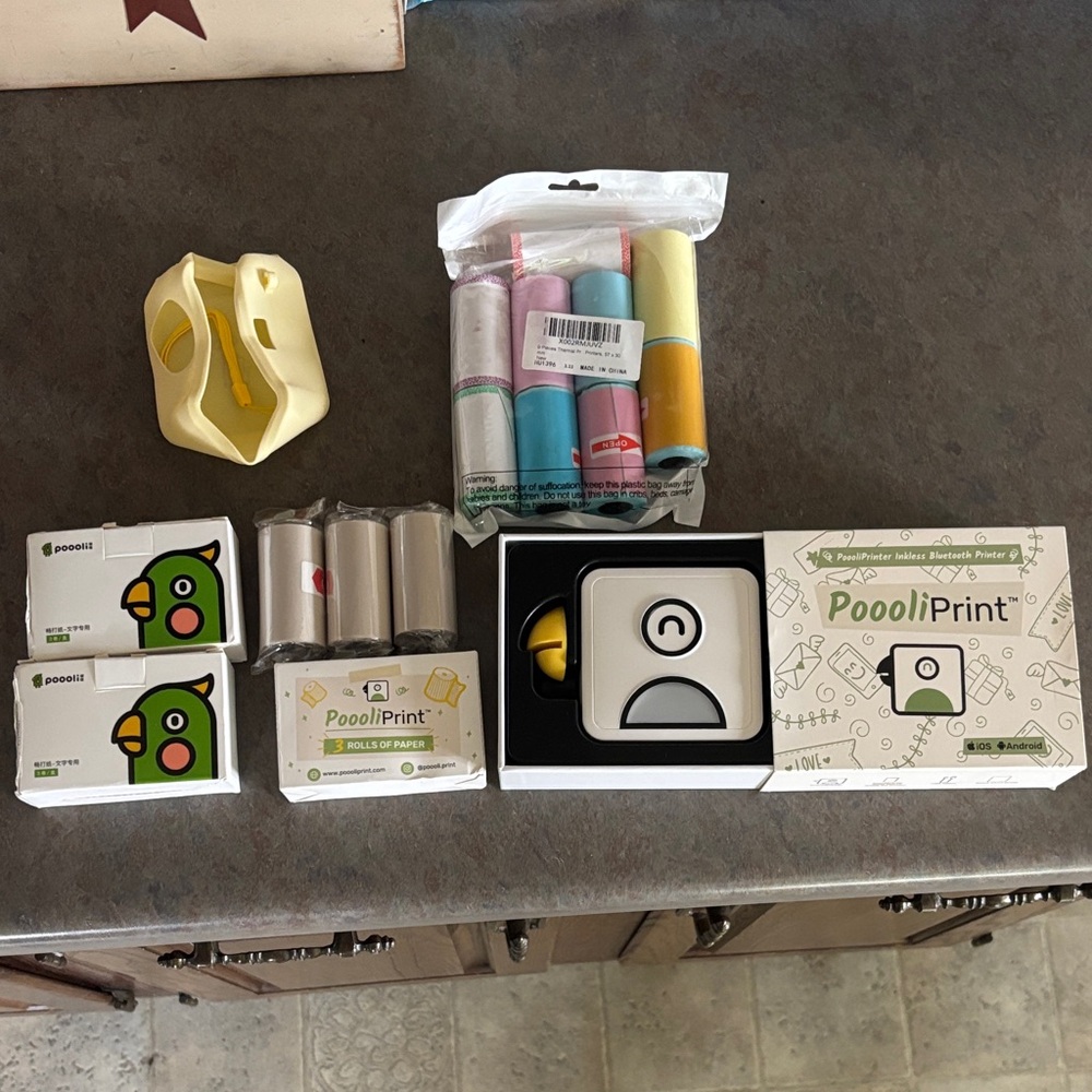 PoooliPrinter Inkless Bluetooth Thermal Printer & 21 Rolls of Paper - Like New